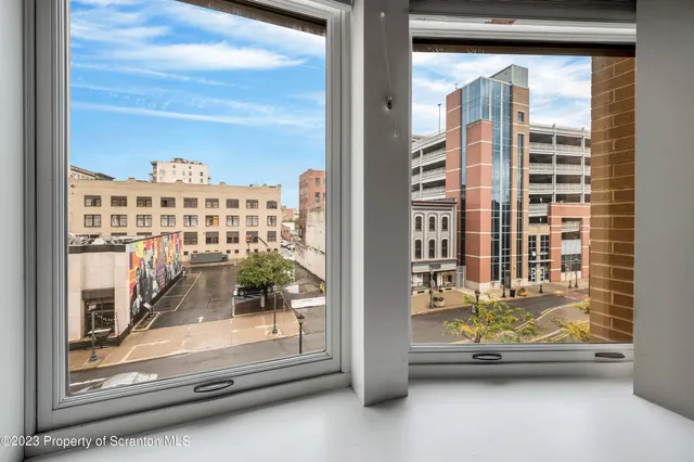 a view of a building with a swimming pool