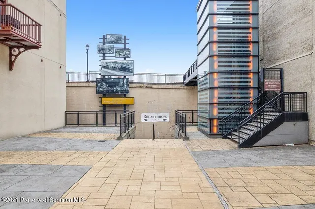 a view of front door and porch with seating space