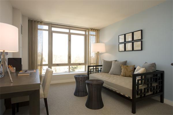 1910 Dorchester Avenue, Unit 517 Boston, MA 02124 - Photo 14 of 15 a living room with furniture and a flat screen tv