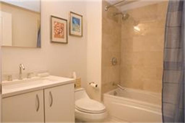 1910 Dorchester Avenue, Unit 517 Boston, MA 02124 - Photo 15 of 15 a bathroom with a sink a toilet and shower