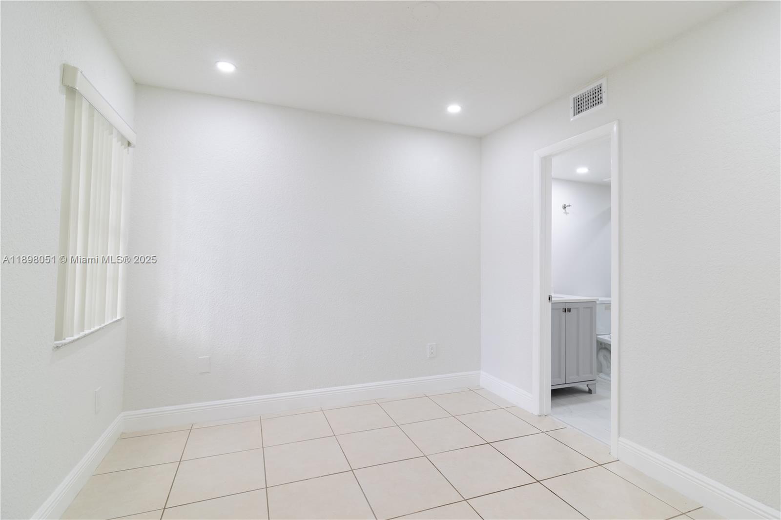 217 Northwest 109th Avenue, Unit 2217 Miami, FL 33172 - Photo 13 of 19 a view of an empty room