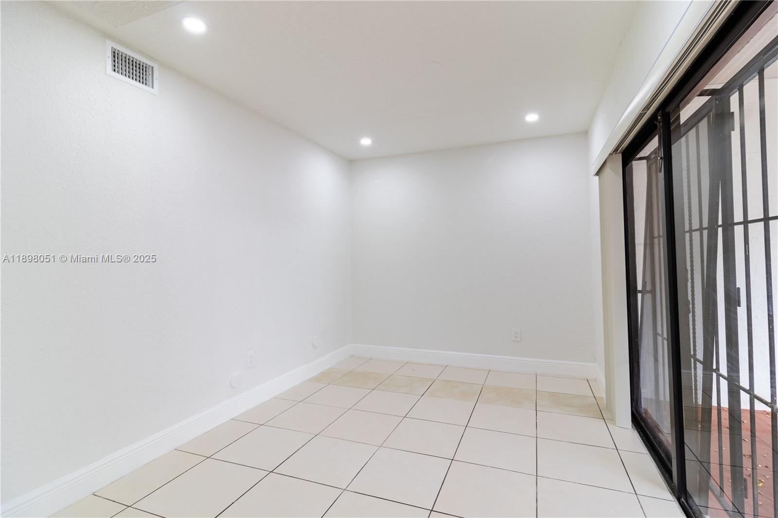 217 Northwest 109th Avenue, Unit 2217 Miami, FL 33172 - Photo 16 of 19 a view of an empty room