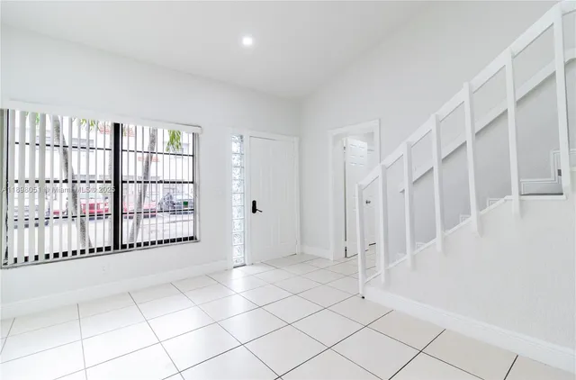 a view of entryway with stairs