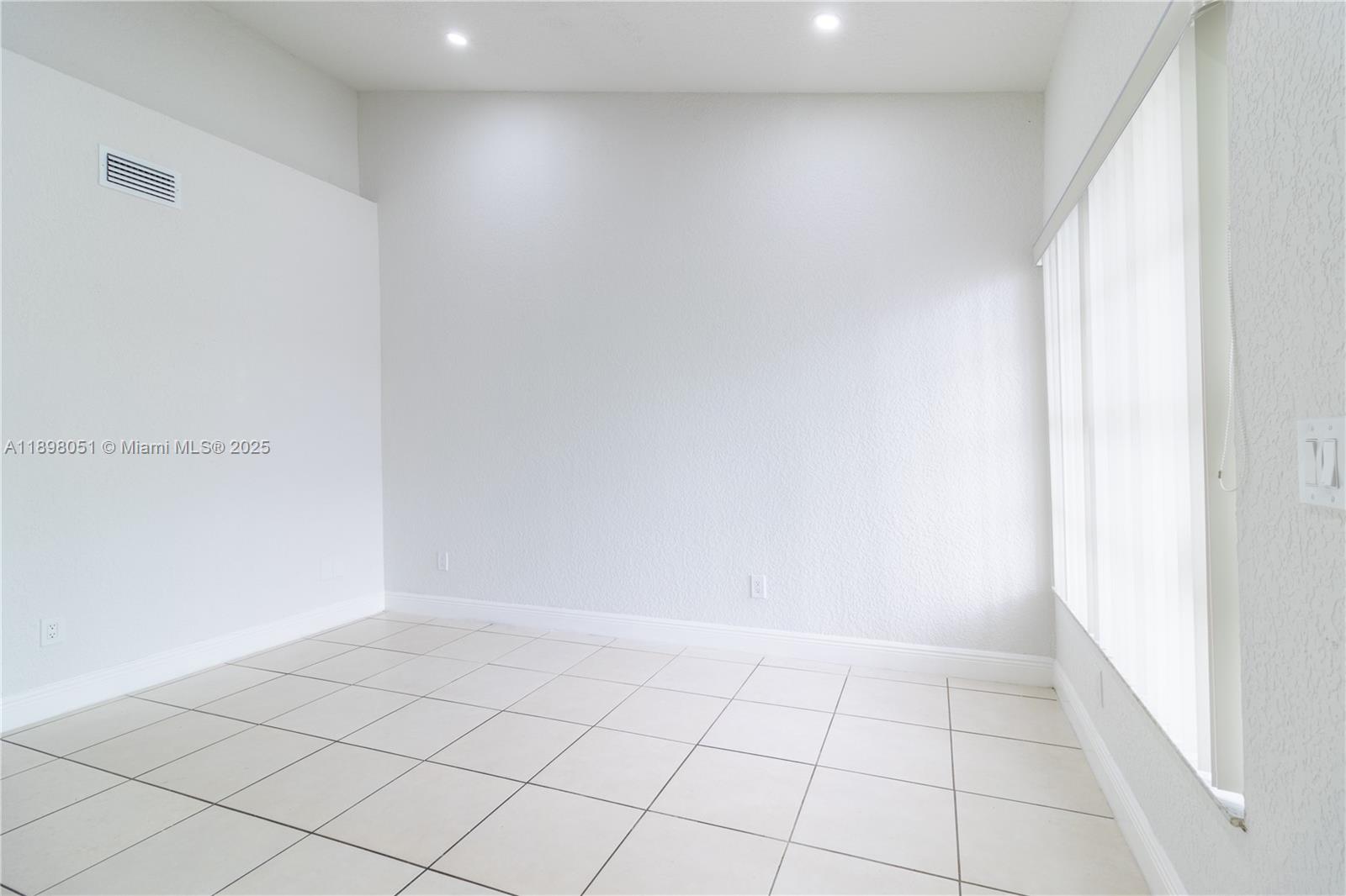 217 Northwest 109th Avenue, Unit 2217 Miami, FL 33172 - Photo 4 of 19 a view of an empty room