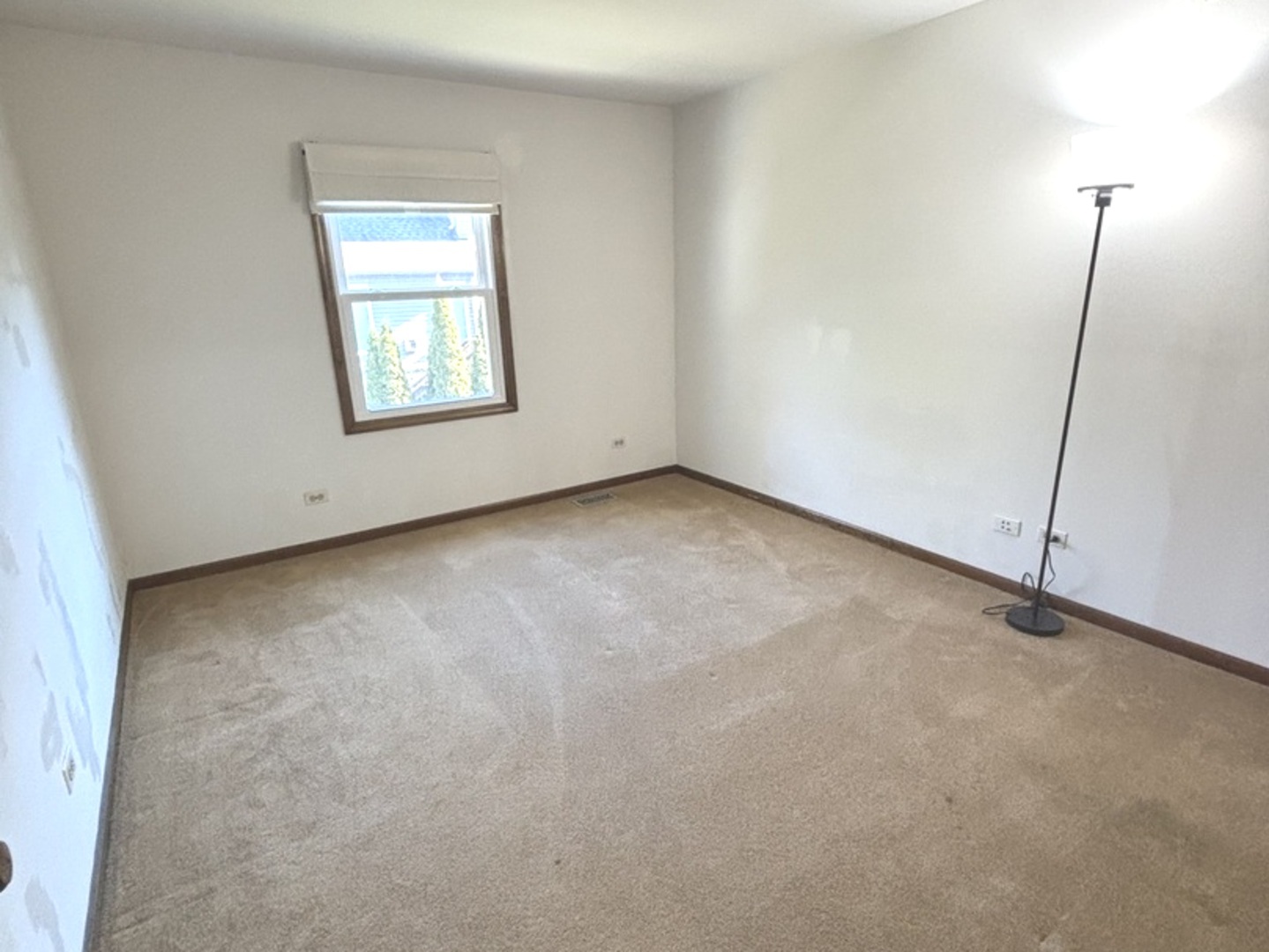 4705 Elm Street Lisle, IL 60532 - Photo 14 of 20 an empty room with windows