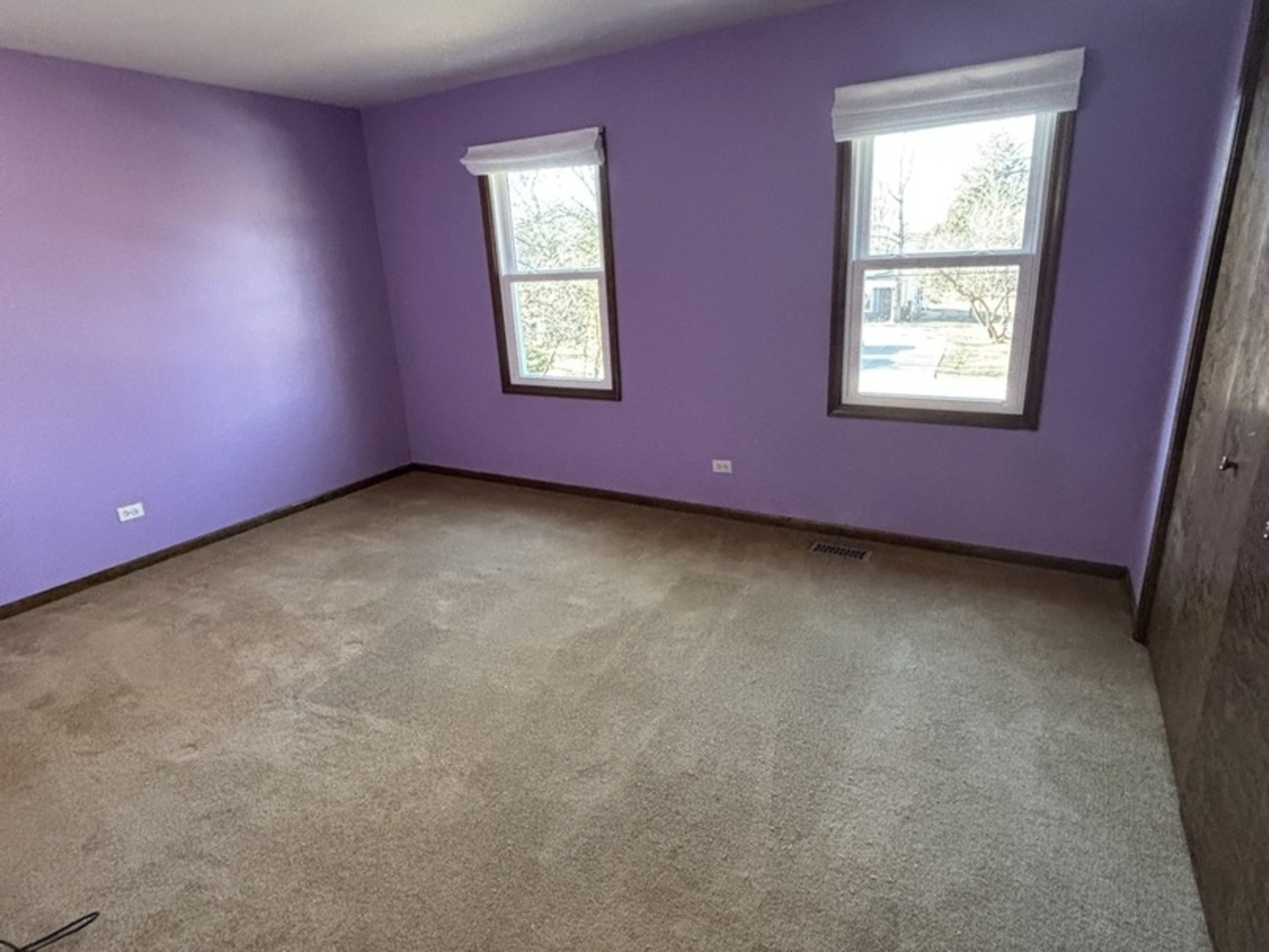 4705 Elm Street Lisle, IL 60532 - Photo 16 of 20 a view of an empty room with a window