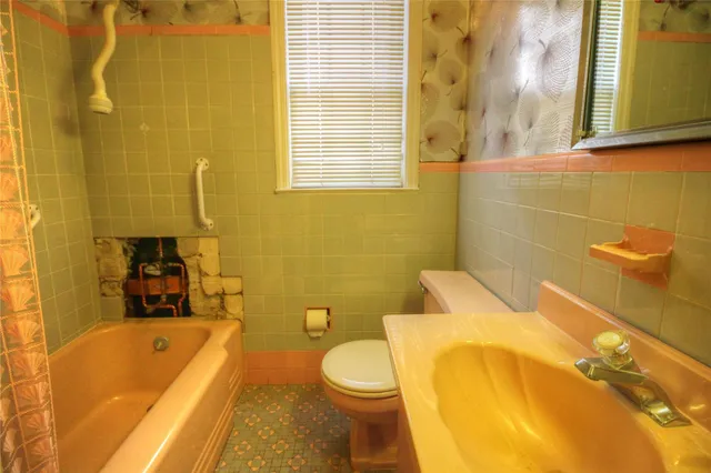 a bathroom with a sink and a bathtub