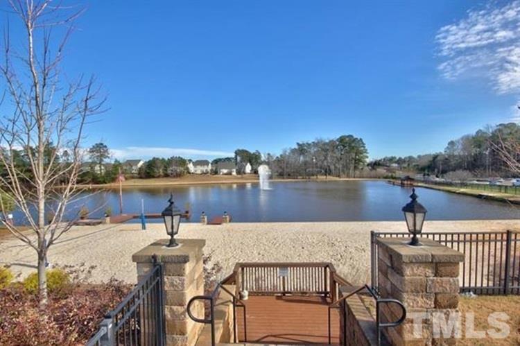 2422 Memory Ridge Drive Raleigh, NC 27606 - Photo 18 of 19 a view of a lake with couches chairs