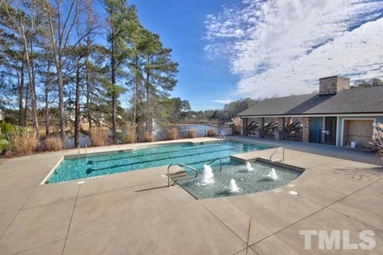 2422 Memory Ridge Drive Raleigh, NC 27606 - Photo 19 of 19 a view of a swimming pool with a patio