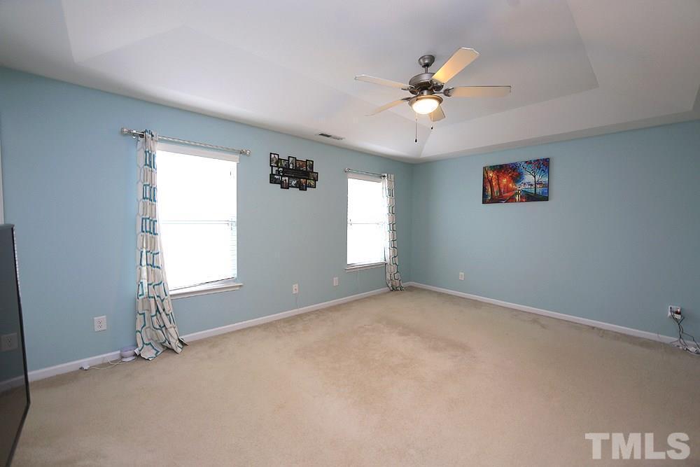 2422 Memory Ridge Drive Raleigh, NC 27606 - Photo 9 of 19 an empty room with a window