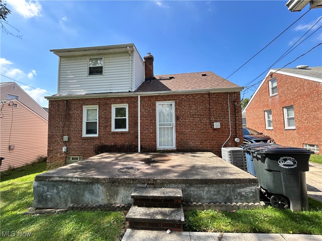 1407 Cranover Road Cleveland, OH 44124 - Photo 43 of 44 Rear view of house featuring cooling unit and a patio