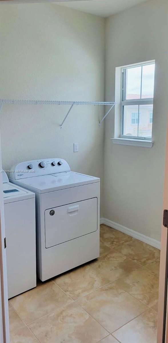 4164 Ficus Street Hollywood, FL 33021 - Photo 12 of 16 a utility room with dryer and washer