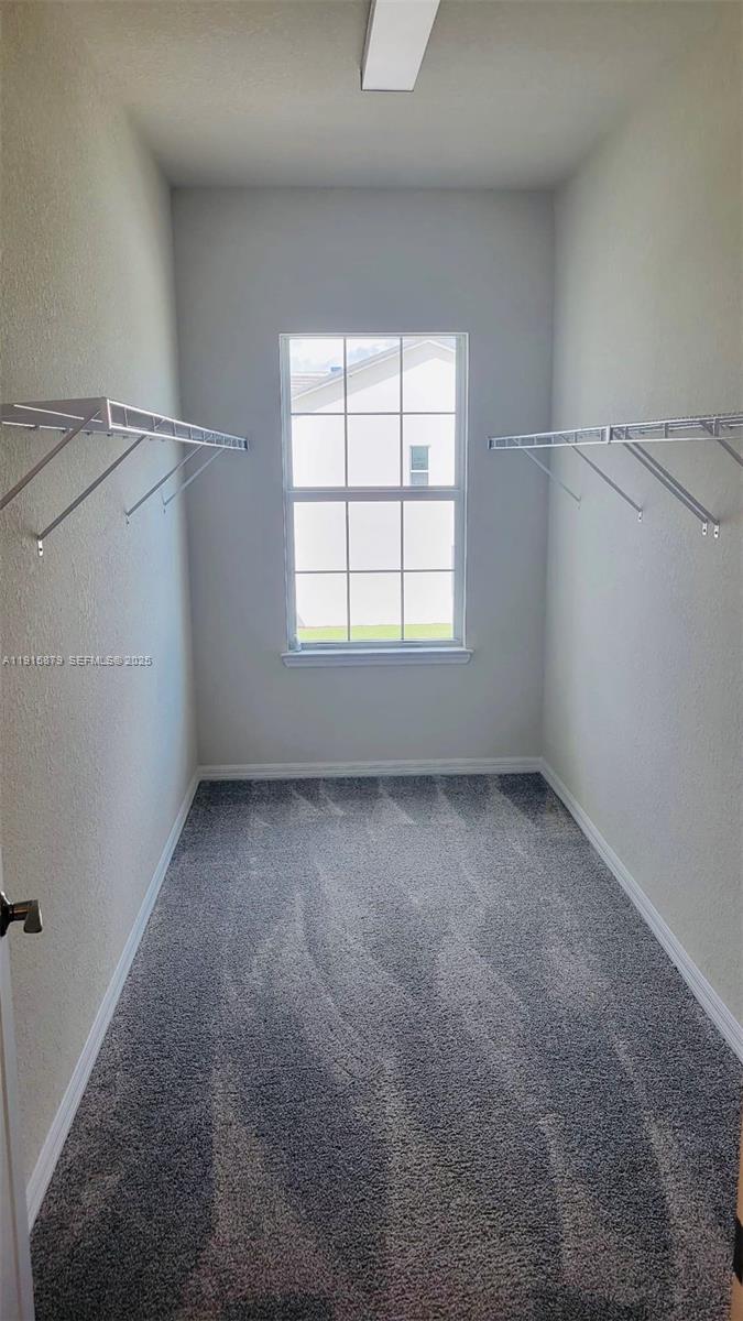 4164 Ficus Street Hollywood, FL 33021 - Photo 5 of 16 an empty room with a window