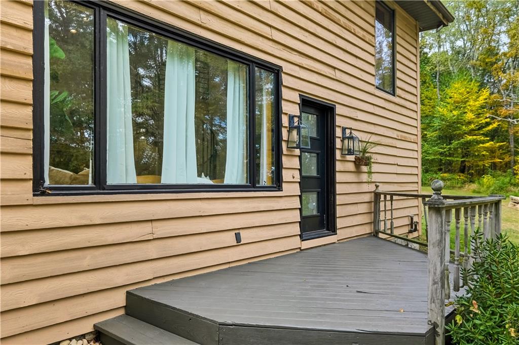 292 Golden Ridge Drive Somerset, PA 15501 - Photo 5 of 49 a view of a balcony with door and wooden floor