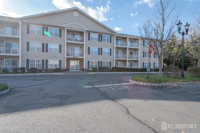 a front view of residential houses with street