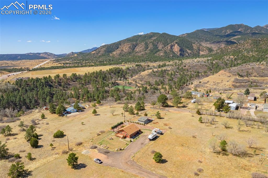 8480 Delaware Road Colorado Springs, CO 80926 - Photo 36 of 49 Overview of rural landscape featuring a mountain backdrop