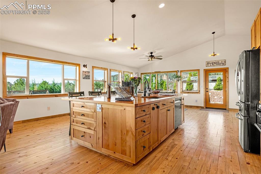8480 Delaware Road Colorado Springs, CO 80926 - Photo 6 of 49 Kitchen with custom made cabinetry