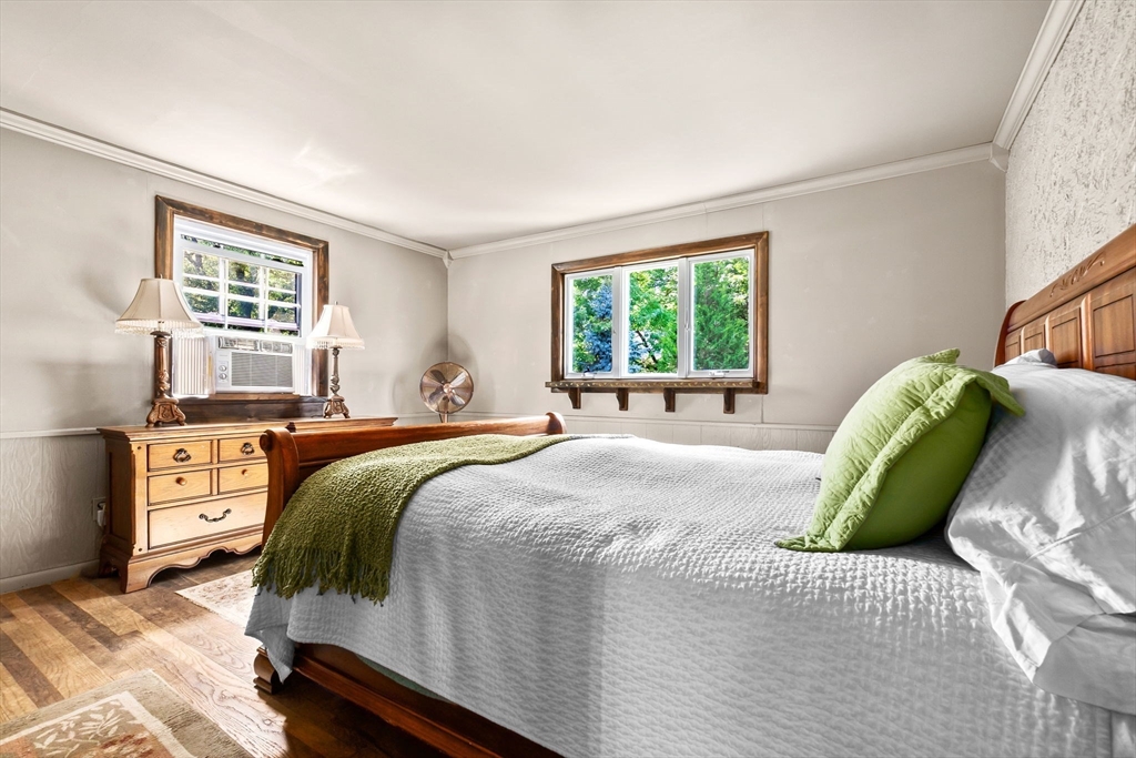 38 Pickering Street Danvers, MA 01923 - Photo 15 of 39 a bedroom with a bed and a window