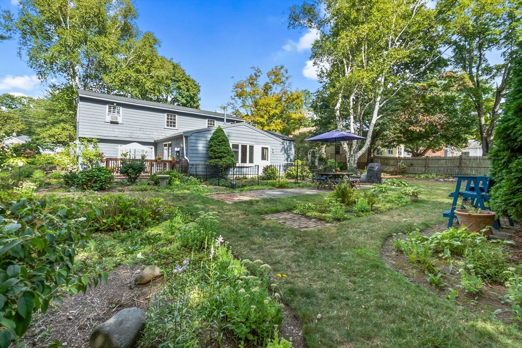 38 Pickering Street Danvers, MA 01923 - Photo 2 of 39 a front view of a house with a yard