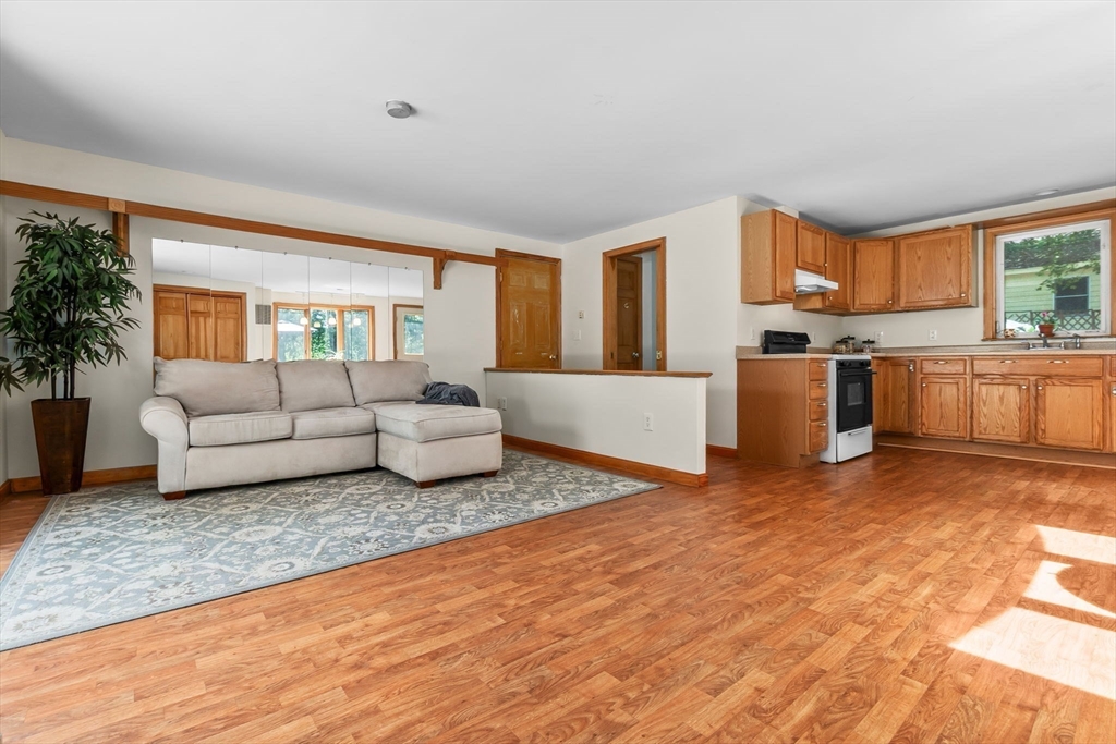 38 Pickering Street Danvers, MA 01923 - Photo 23 of 39 a living room with furniture and a couch