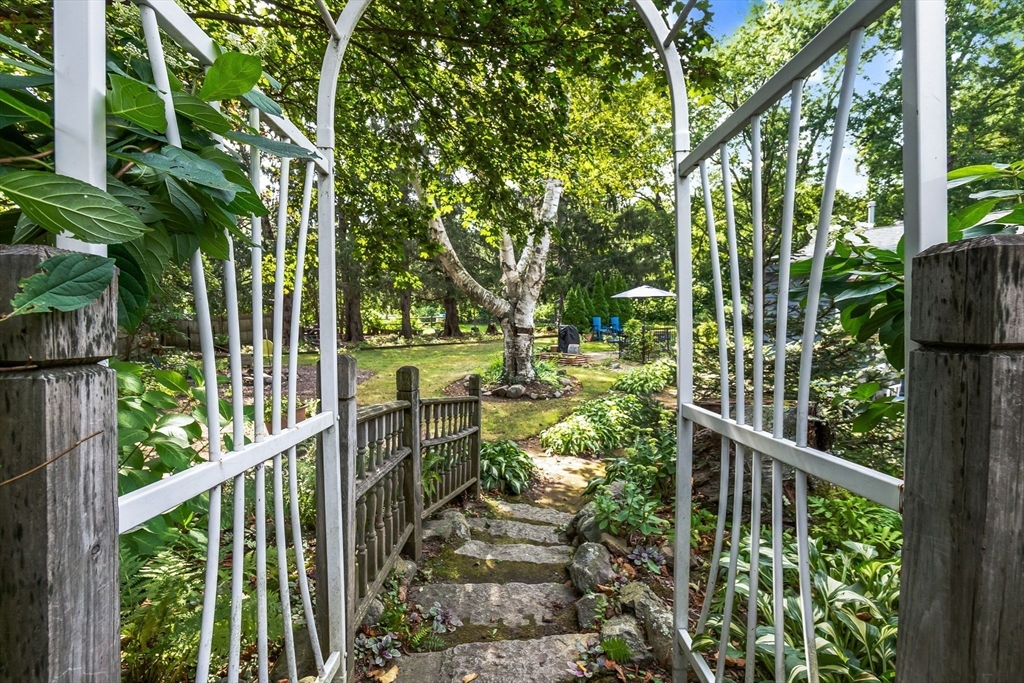 38 Pickering Street Danvers, MA 01923 - Photo 31 of 39 a view of a chair and tables in the balcony