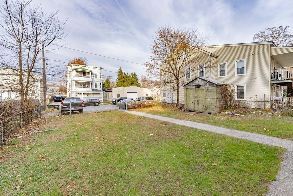 254-256 Main Street Springfield, MA 01151 - Photo 28 of 34 a view of a yard with cars
