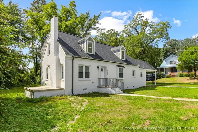a house view with a garden space