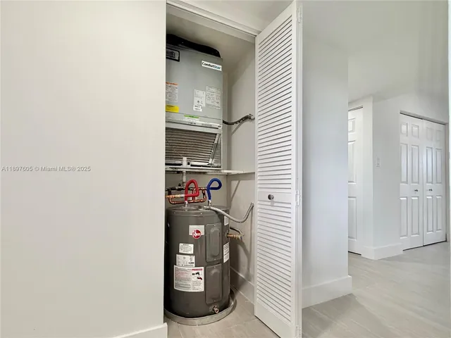 a room that has a toilet and a window in it