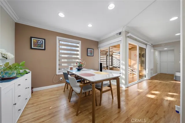 a kitchen with counter top space cabinets and stainless steel appliances