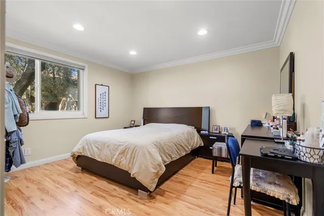 a bedroom with a bed and a table