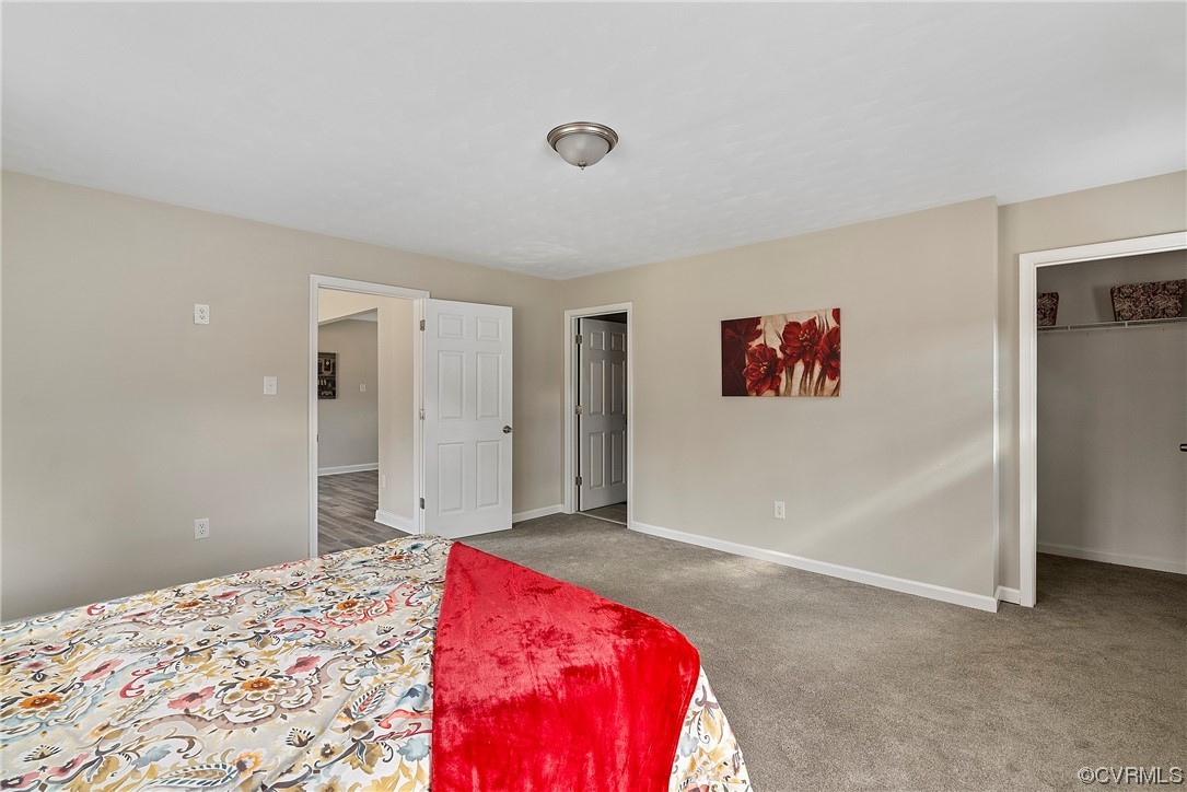 988 3 Notch Road Kents Store, VA 23084 - Photo 14 of 32 Bedroom featuring dark colored carpet