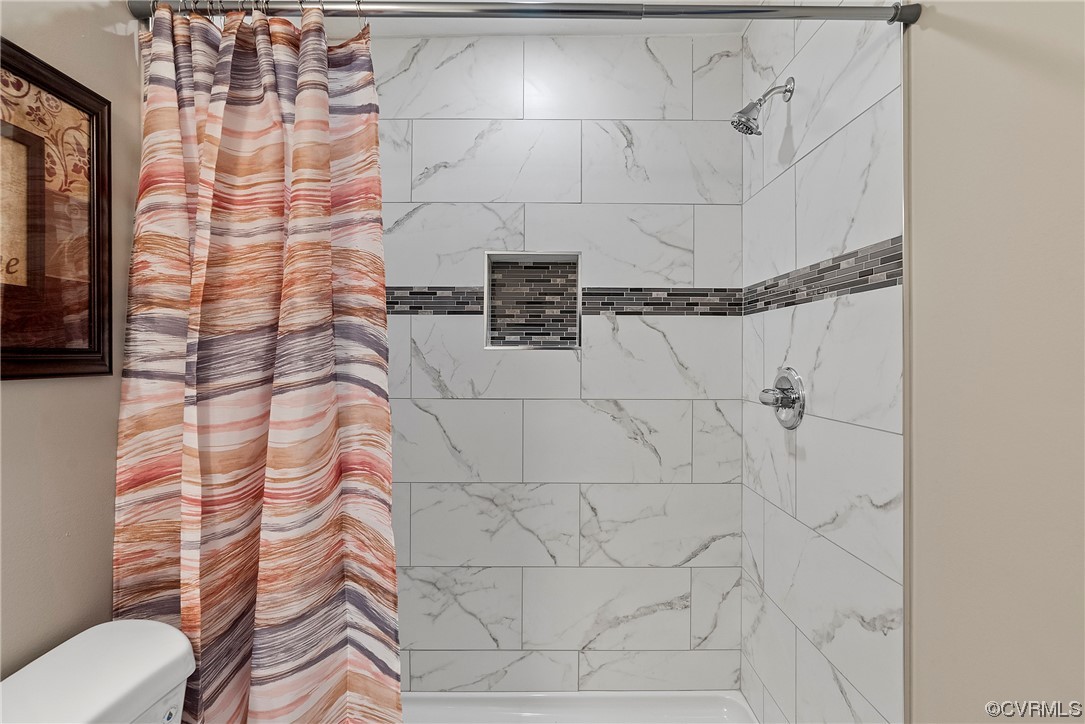 988 3 Notch Road Kents Store, VA 23084 - Photo 15 of 32 Bathroom with tiled shower and ceramic floors