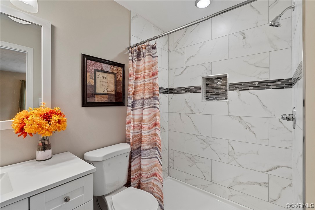 988 3 Notch Road Kents Store, VA 23084 - Photo 16 of 32 Full bathroom featuring toilet, vanity with extens