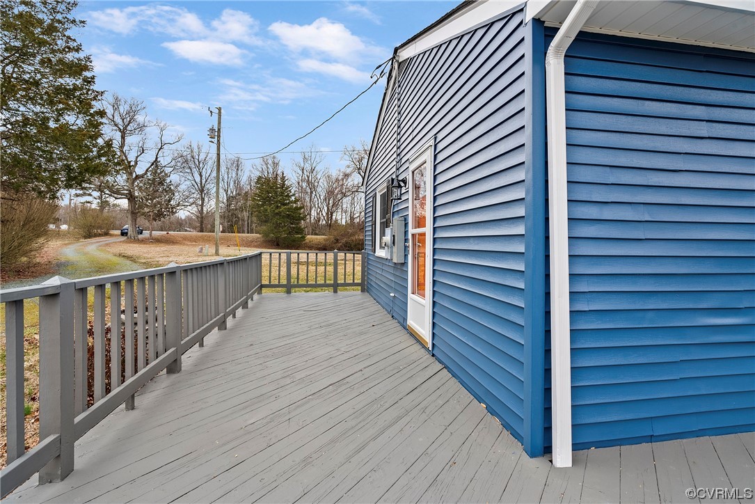 988 3 Notch Road Kents Store, VA 23084 - Photo 29 of 32 View of side of deck with entry to primary bedroom