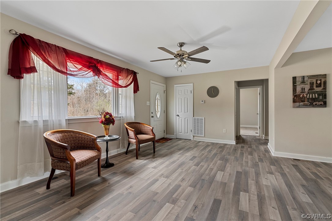 988 3 Notch Road Kents Store, VA 23084 - Photo 3 of 32 Family room featuring ceiling fan and LPV flooring