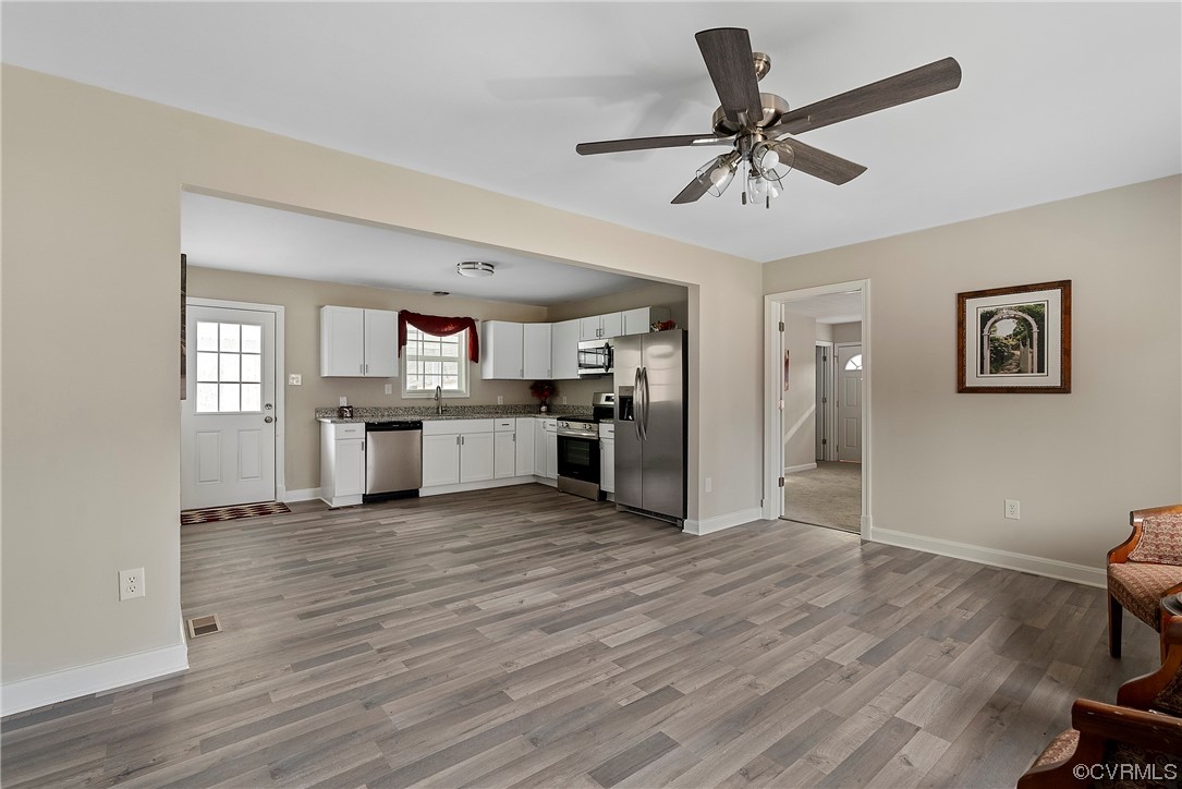 988 3 Notch Road Kents Store, VA 23084 - Photo 5 of 32 Living room with LPV flooring--Open to kitchen