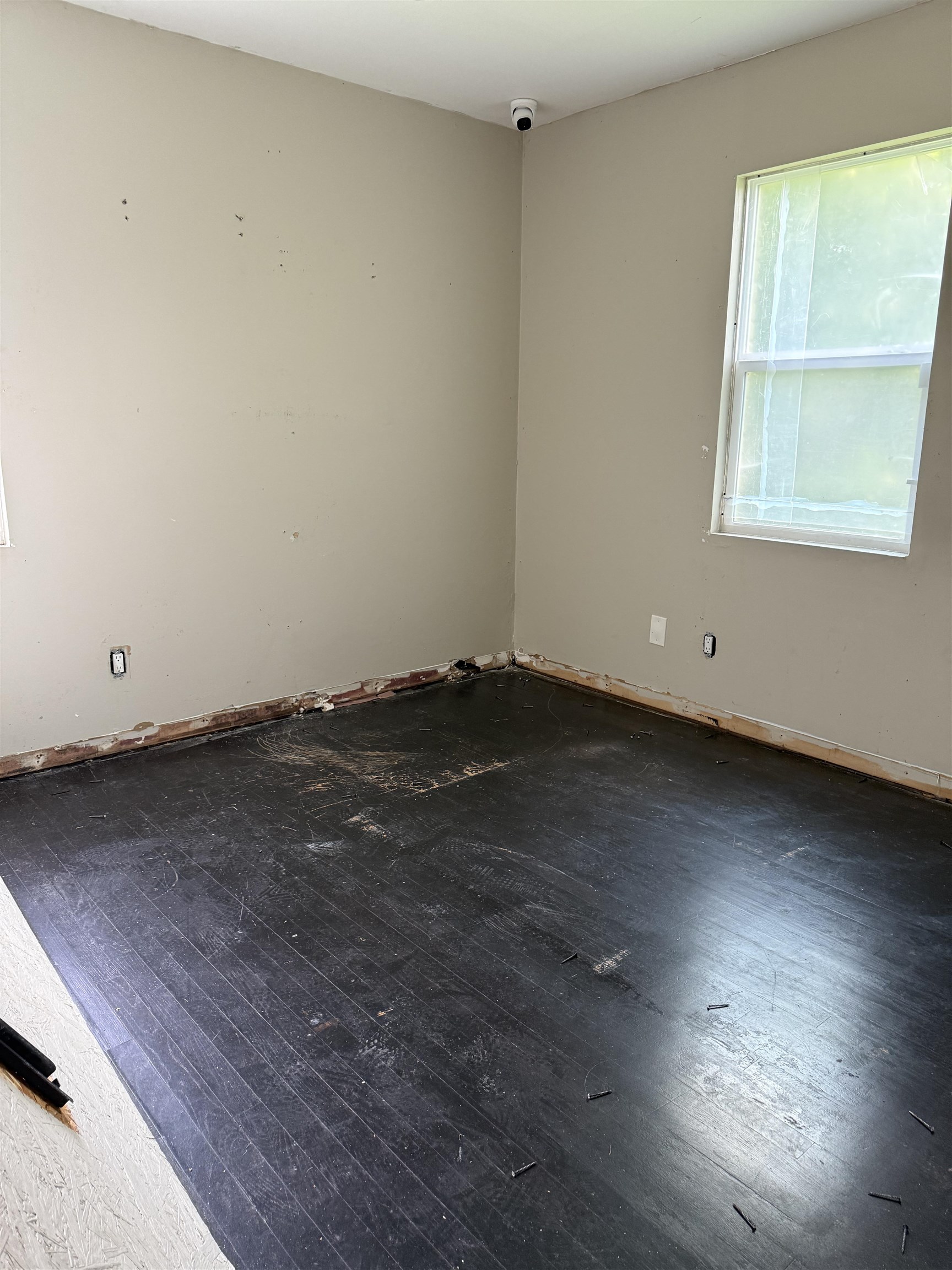 4826 Peace Street Memphis, TN 38109 - Photo 9 of 13 an empty room with wooden floor