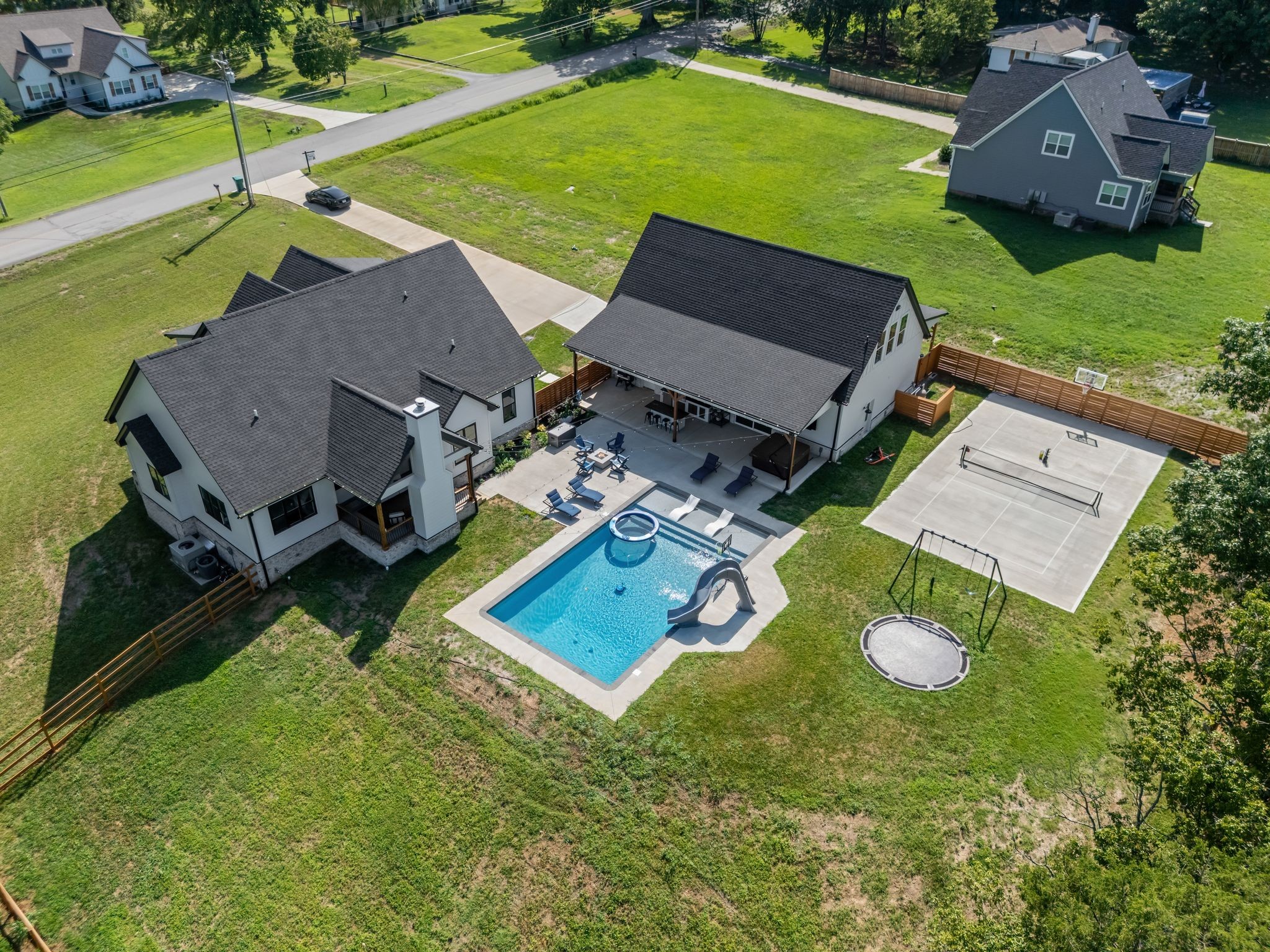 430 Northern Road Mount Juliet, TN 37122 - Photo 54 of 71 an aerial view of a house with swimming pool and garden