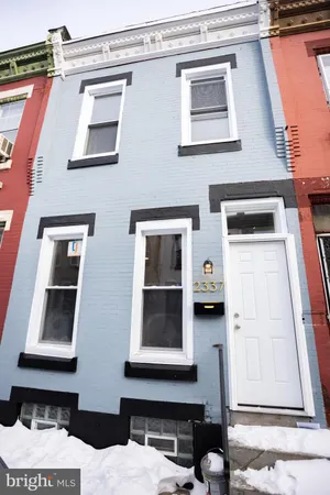 a front view of a house with a window