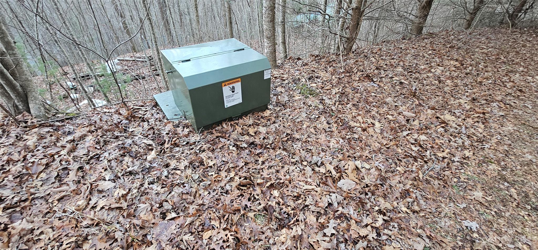 Lot 14 Seay Mountain Road Waynesville, NC 28785 - Photo 12 of 29 a bench sitting in a backyard
