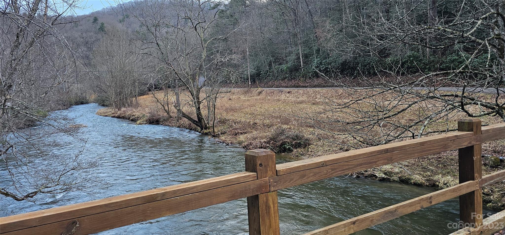 Lot 14 Seay Mountain Road Waynesville, NC 28785 - Photo 10 of 29 a view of a yard with wooden fence