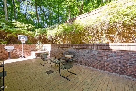 a view of house with a yard