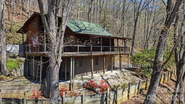 front view of a house with a tree