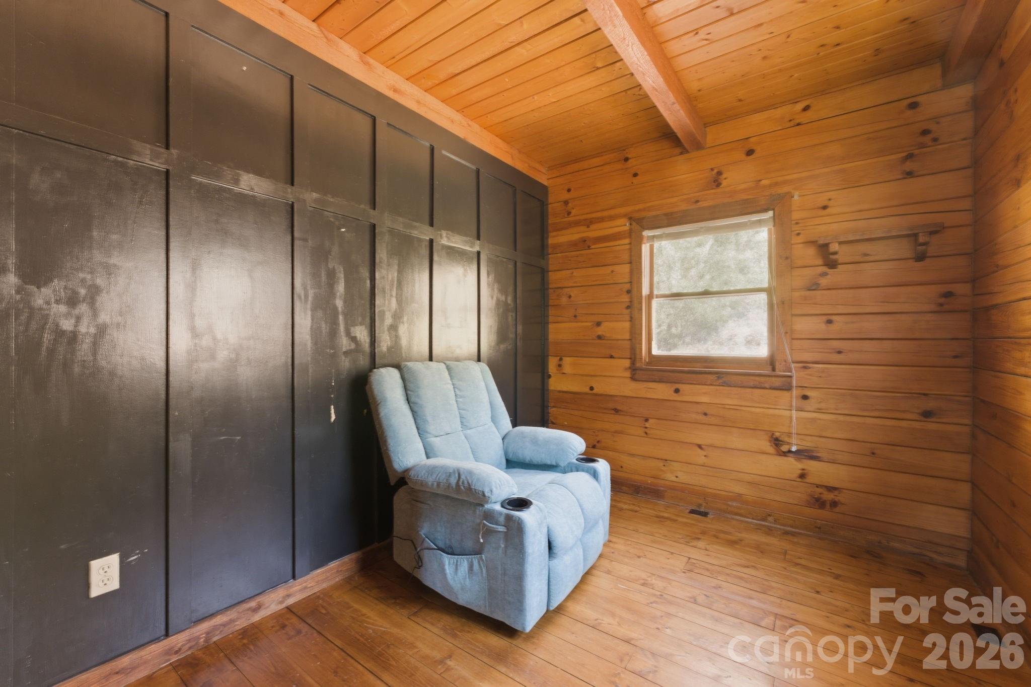 1837 East Alarka Road Bryson City, NC 28713 - Photo 26 of 34 a living room with furniture and a window