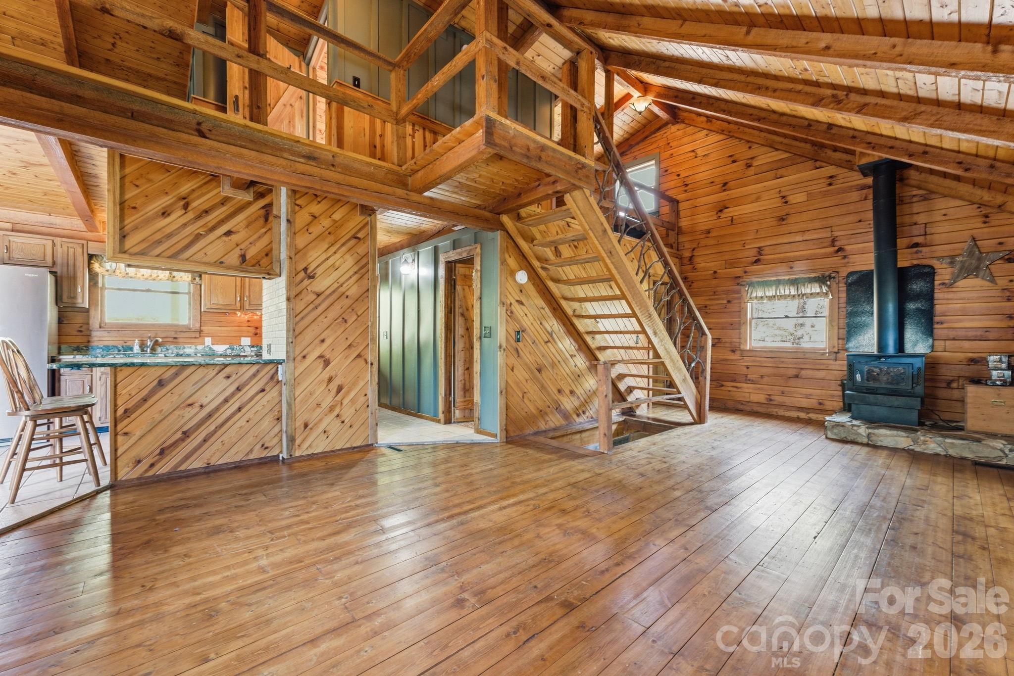 1837 East Alarka Road Bryson City, NC 28713 - Photo 4 of 39 a view of an entryway with wooden floor