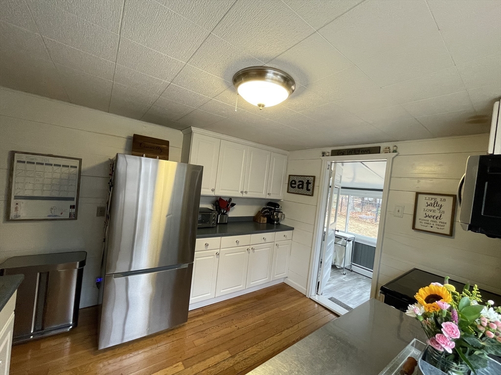 95 Pleasant Circle Canton, MA 02021 - Photo 8 of 17 a kitchen with stainless steel appliances granite countertop a refrigerator sink and stove