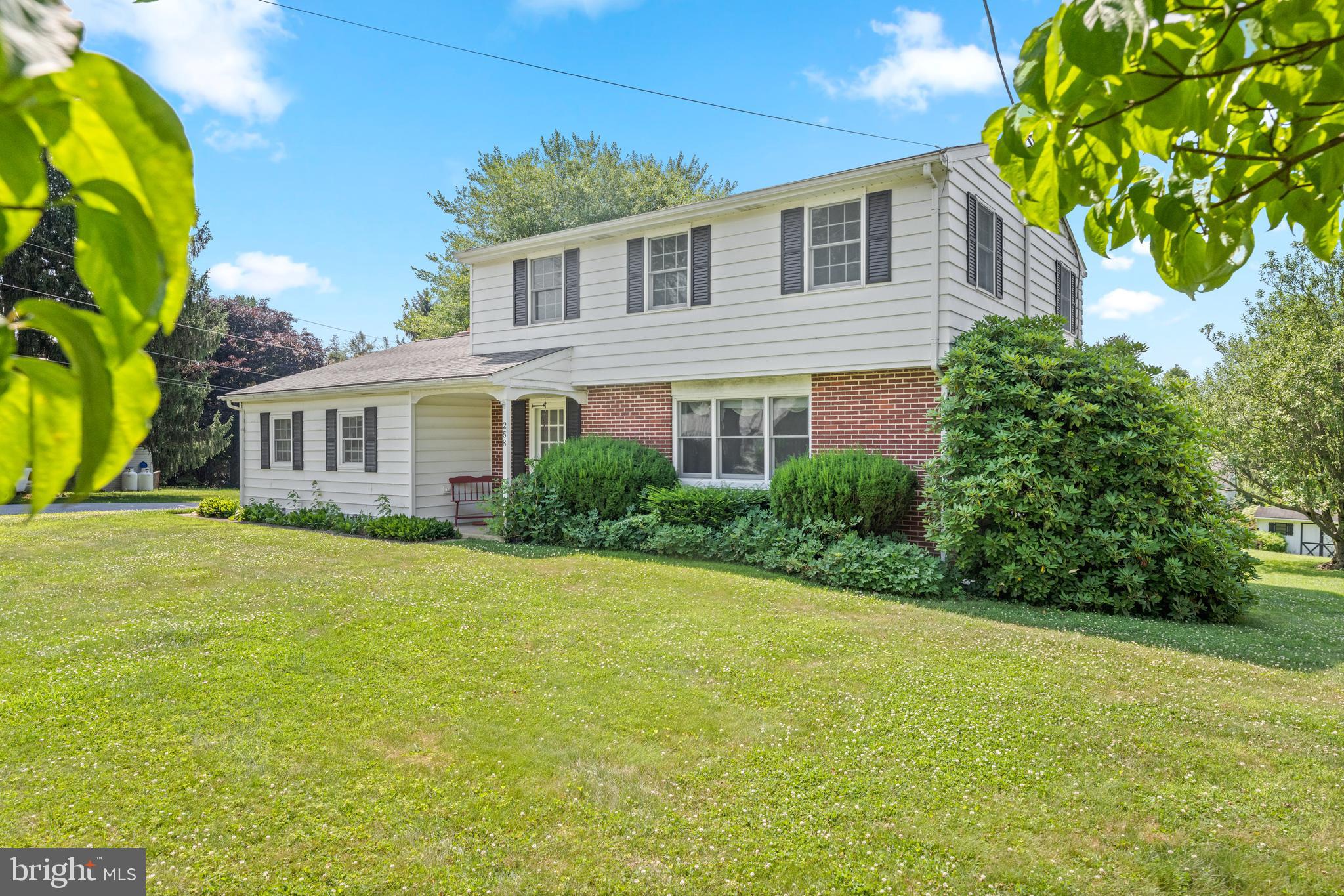 258 Monacy Road Coatesville, PA 19320 - Photo 53 of 54 a front view of a house with a garden