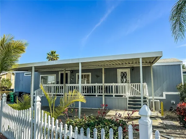 a house view with a garden space