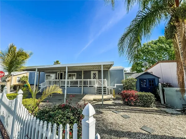 a house view with a garden space