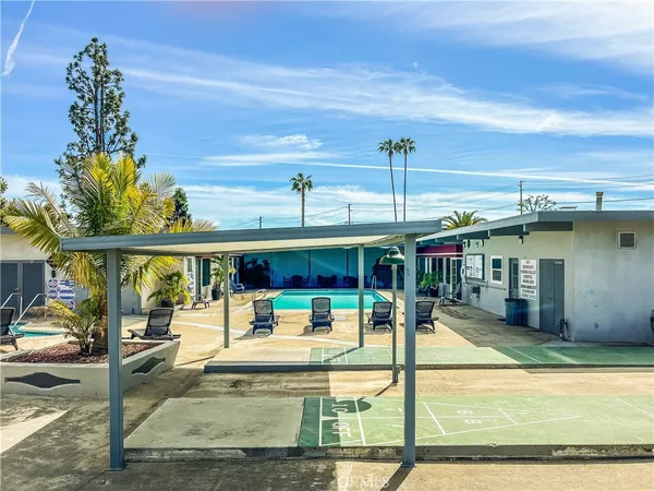 a view of a lounge chairs in the patio